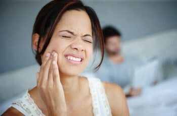 a girl facing jaw problem