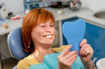 a woman smiling beautifully