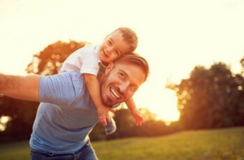 a dad enjoying with his son